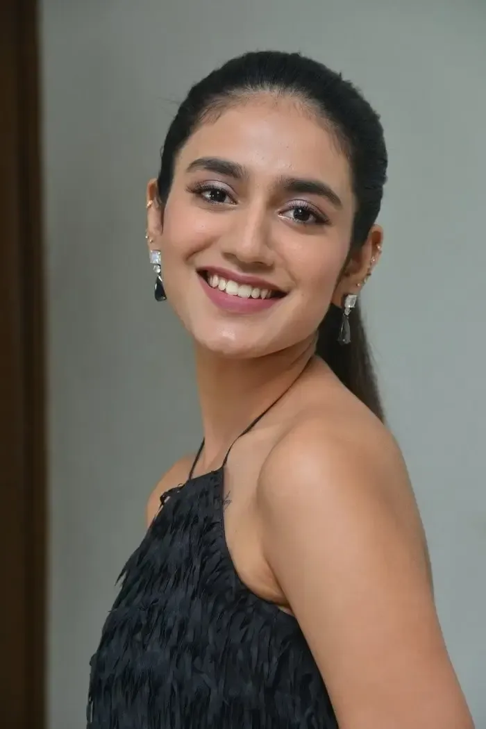 TELUGU ACTRESS PRIYA PRAKASH VARRIER IN SLEEVELESS BLACK GOWN 15